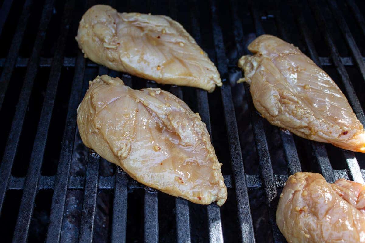 Lemon chicken on a gas grill.