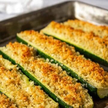 Zucchini filled with bread crumbs.