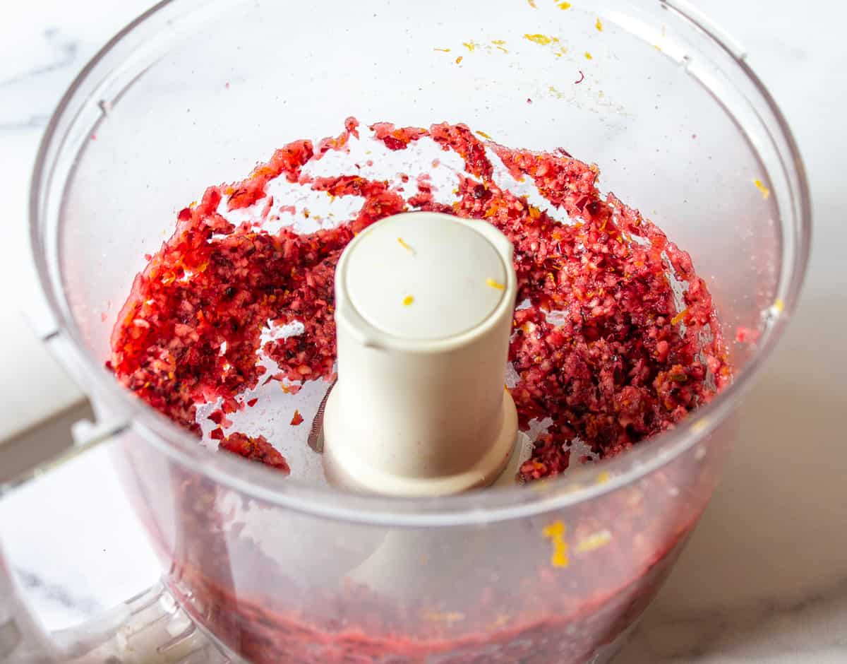 Finely chopped cranberries in a food processor.