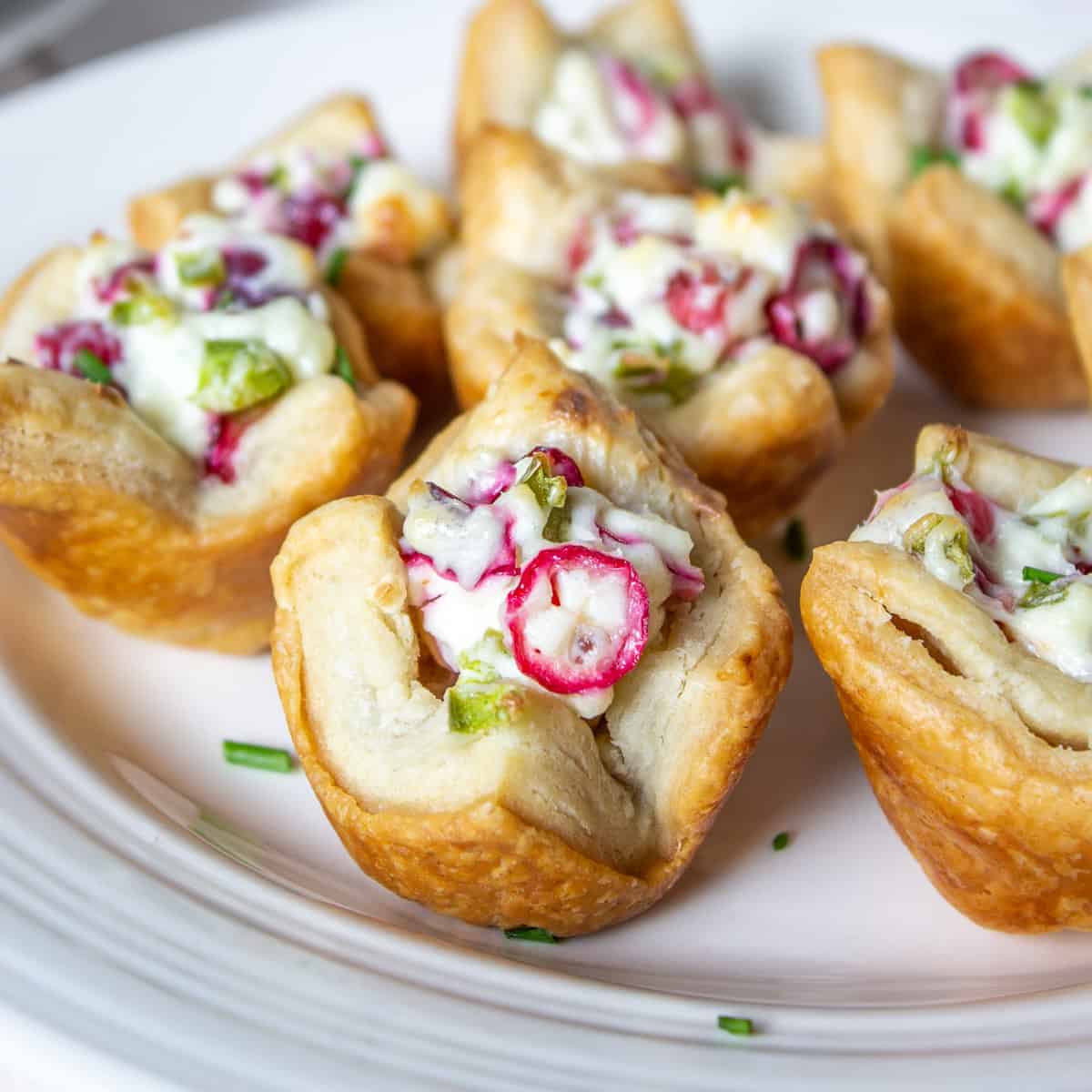 Puff pastry filled with cream cheese, cranberries and jalapenos.