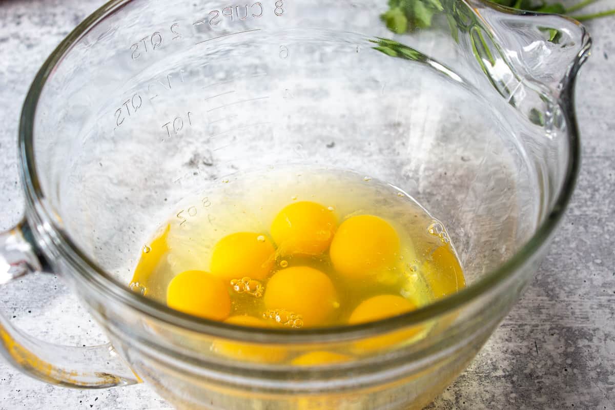 A glass bowl filled with eggs.