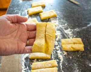 An indentation cut into the center of dough.