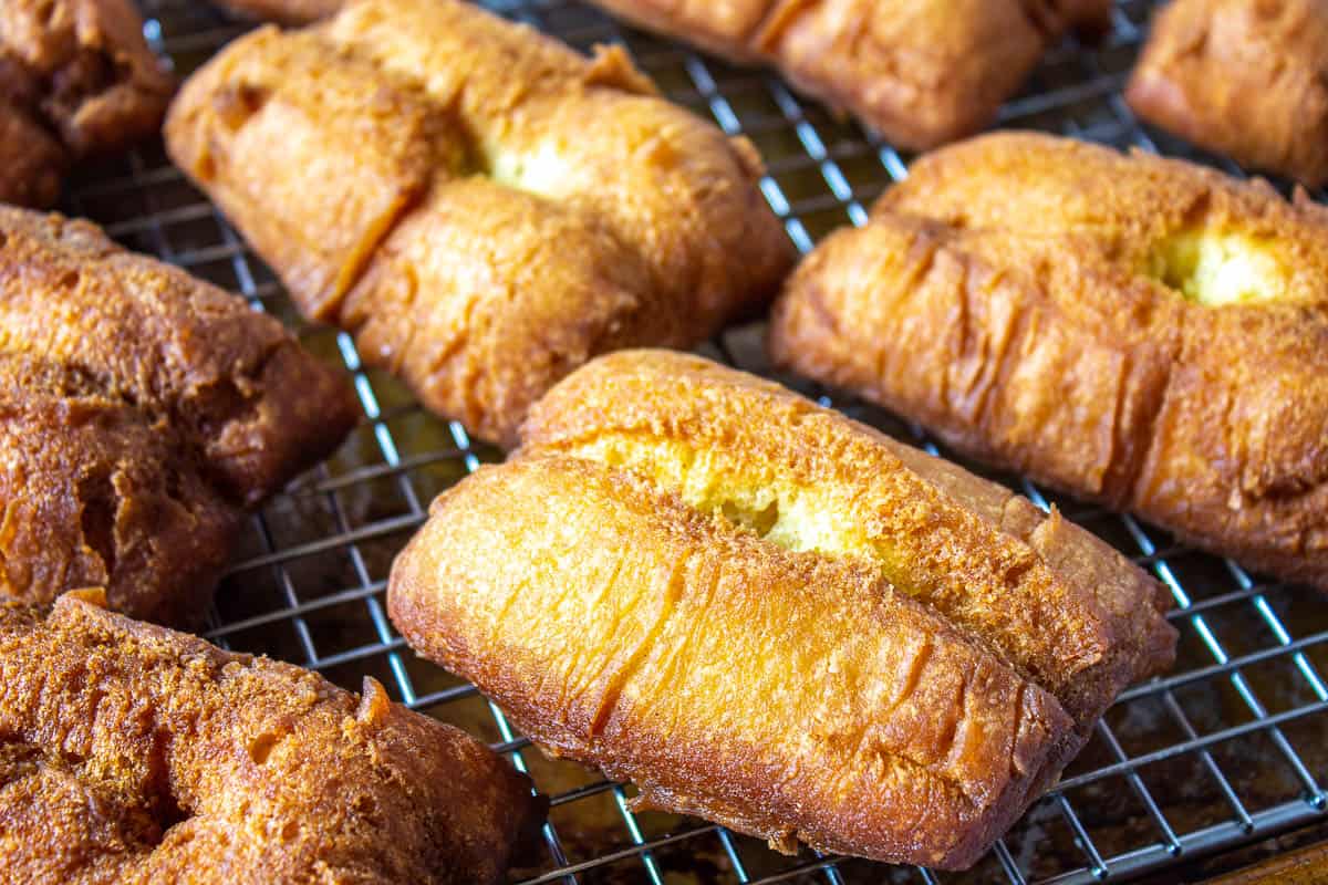 Fried bars on a baking rack.