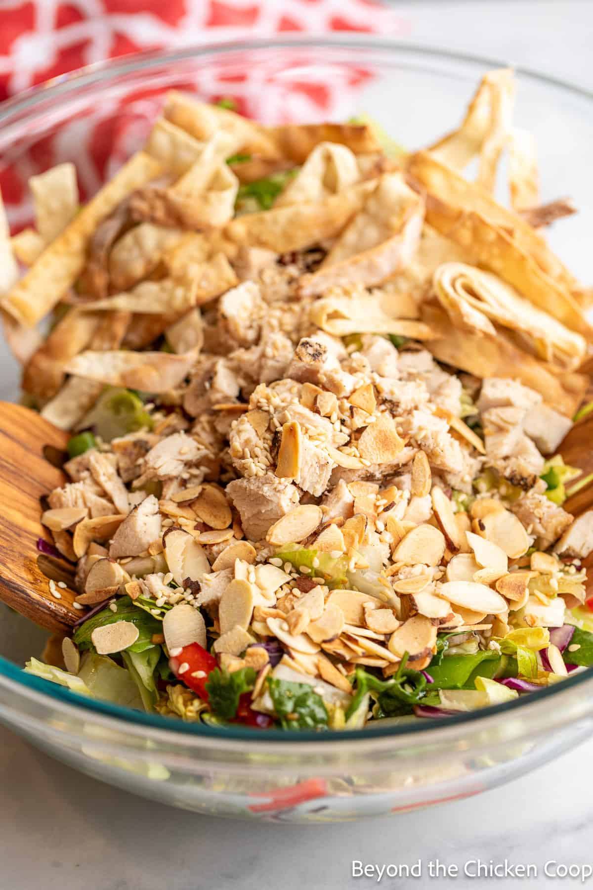 Chopped chicken added to a salad. 