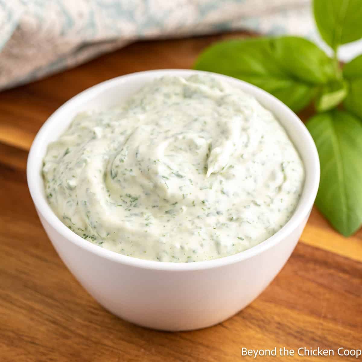 A bowl filled with basil aioli.