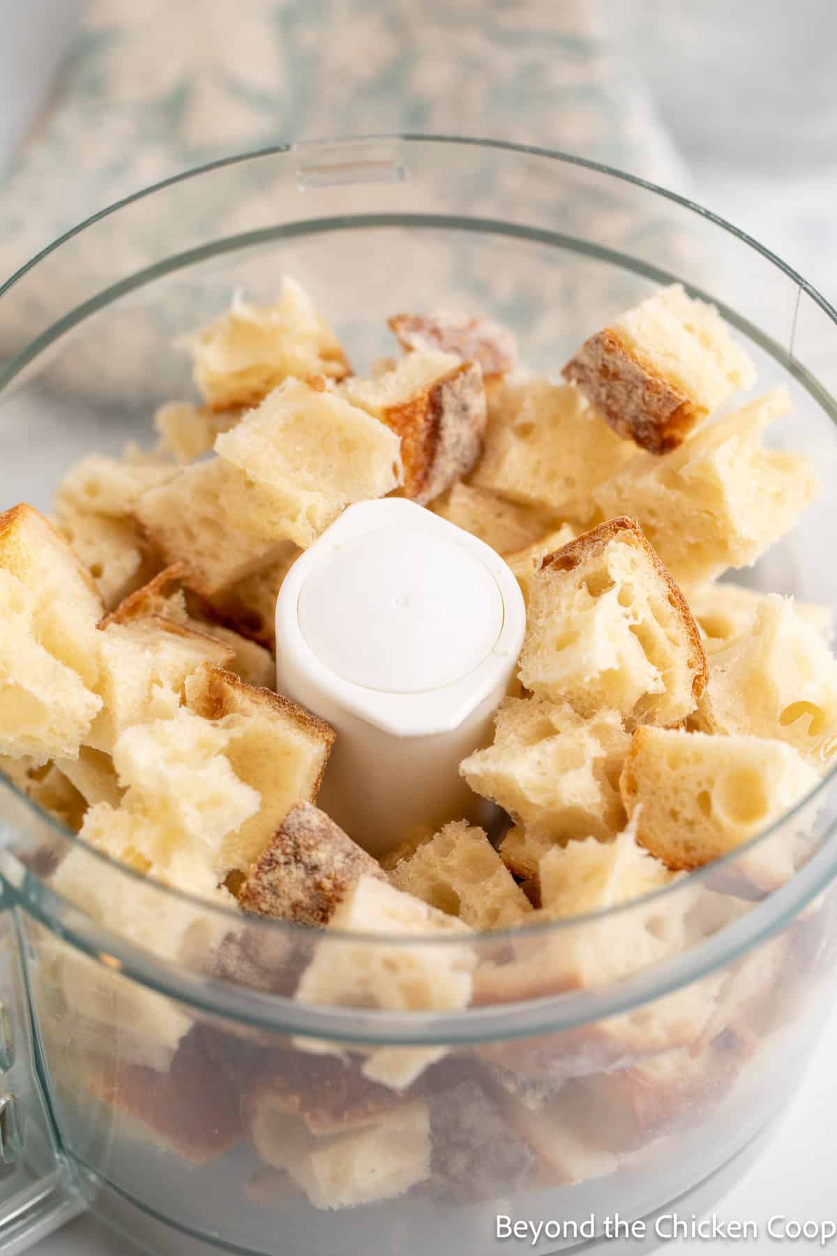 Bread cubes in a food processor. 