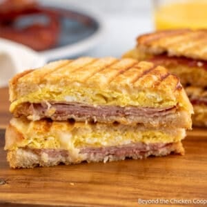 A panini sandwich filled with eggs and ham.