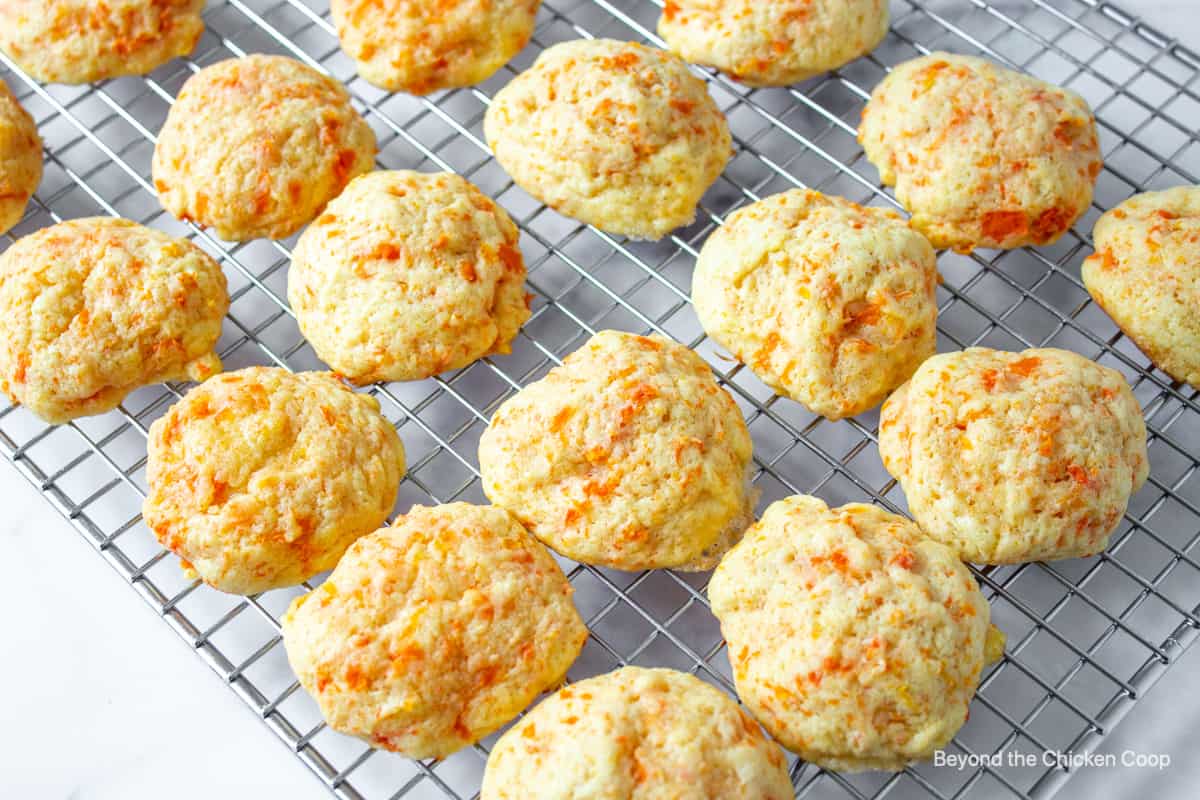 A baking rack filled with carrot cookies.