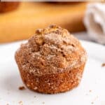 A muffin topped with cinnamon sugar.