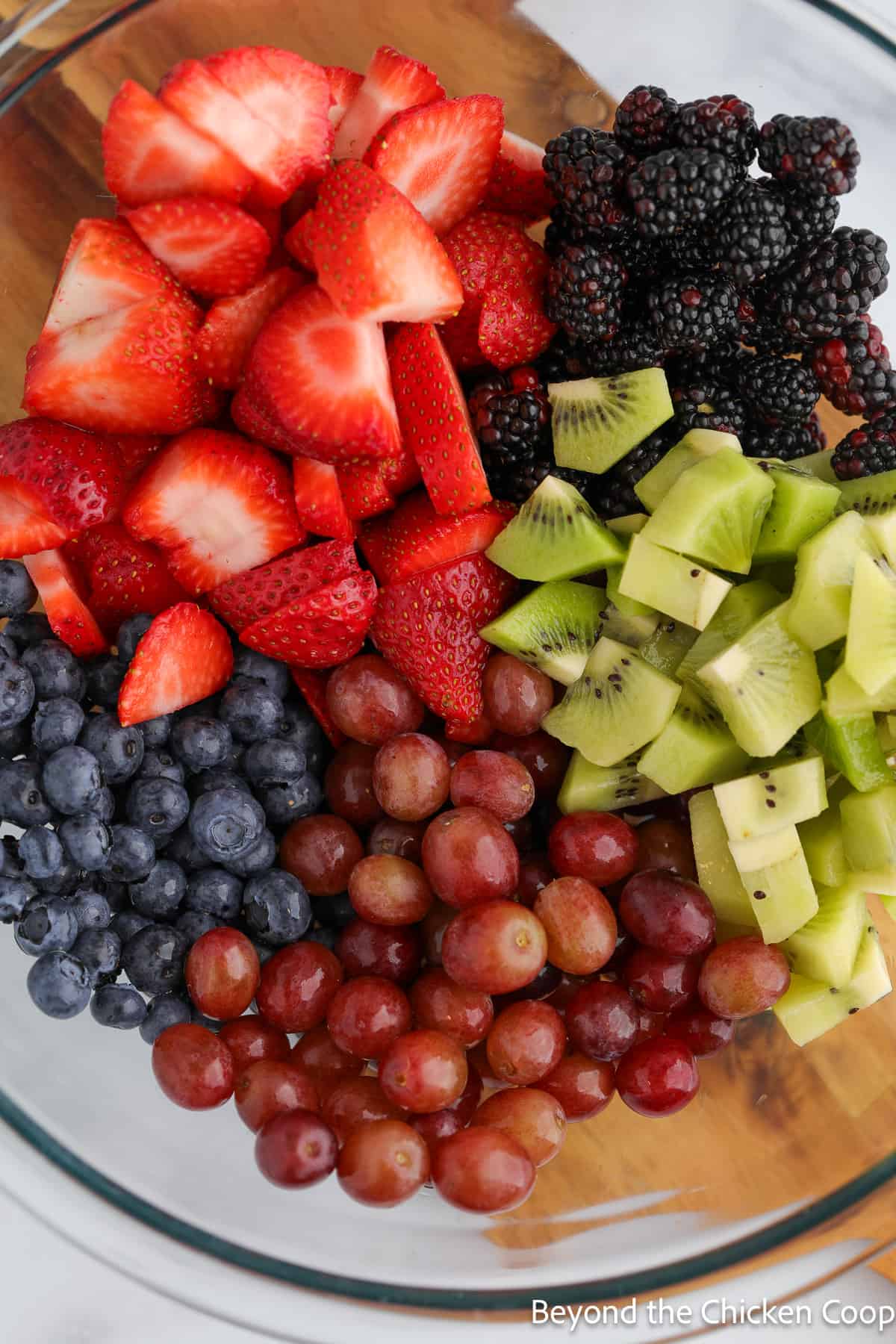 Cut fruit in a bowl. 