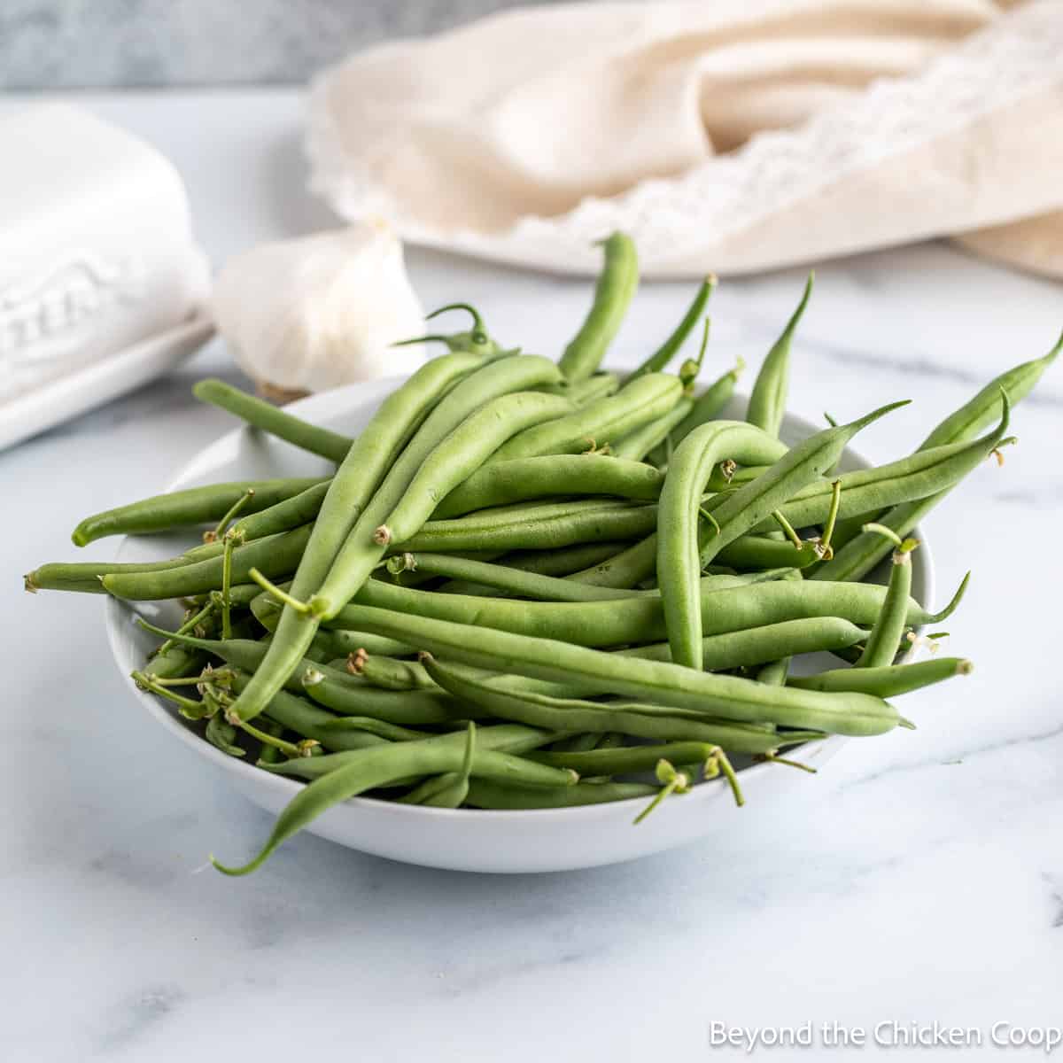 Fresh green beans in a bowl. 