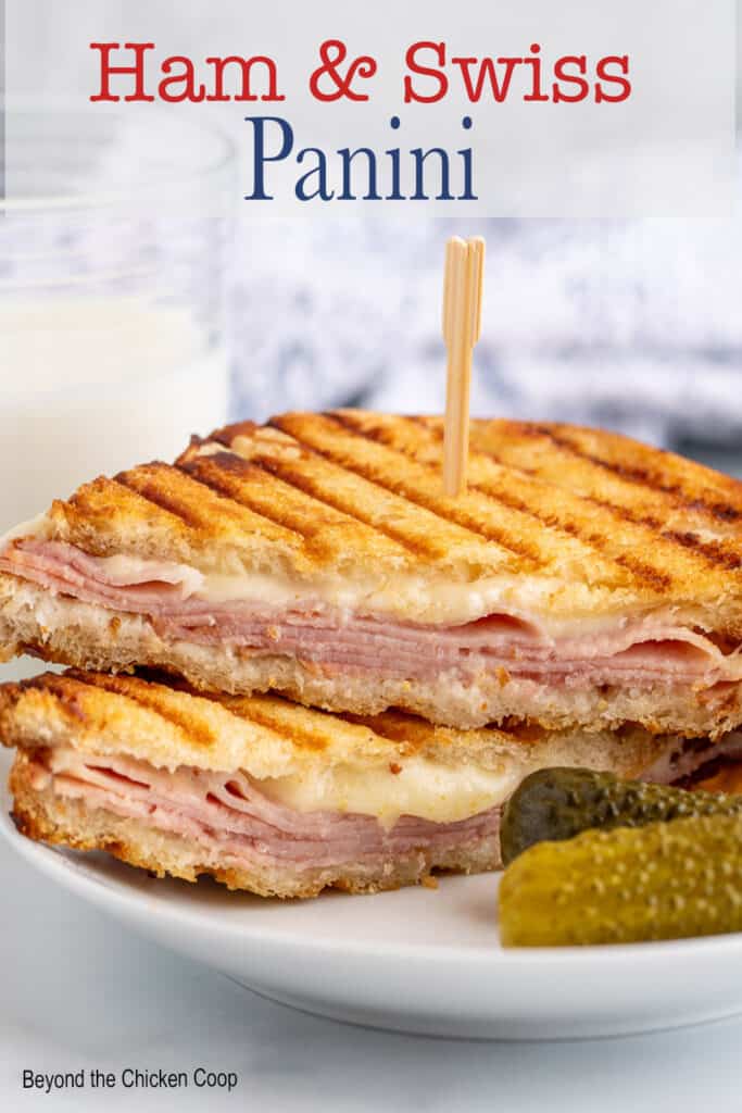 Grilled panini sandwich filled with ham and cheese.
