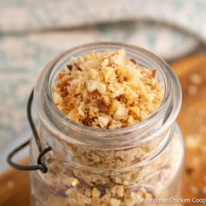 A jar with breadcrumbs.