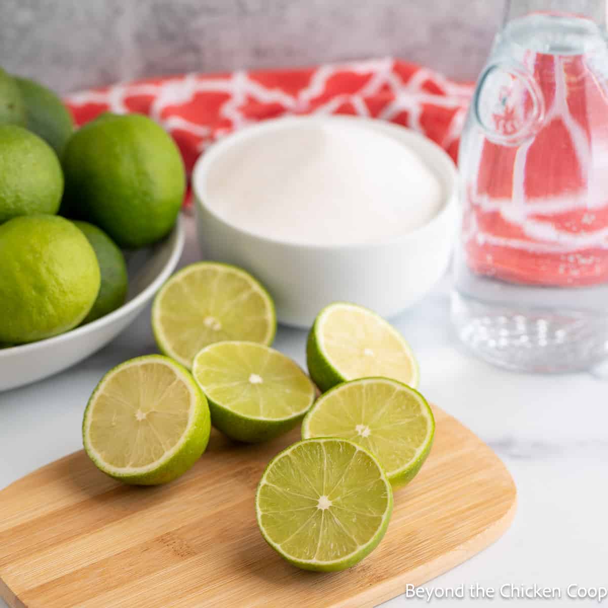 Freshly cut limes on a board. 