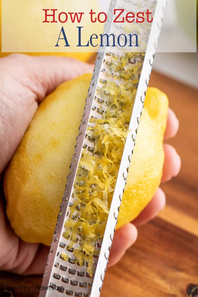 Zesting a lemon with a hand grater.