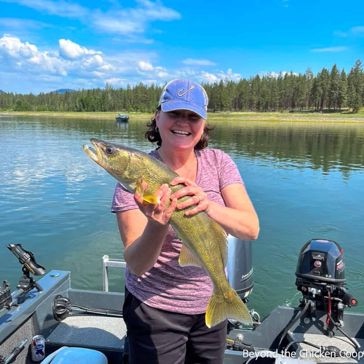 Kathy holding a large walleye. 