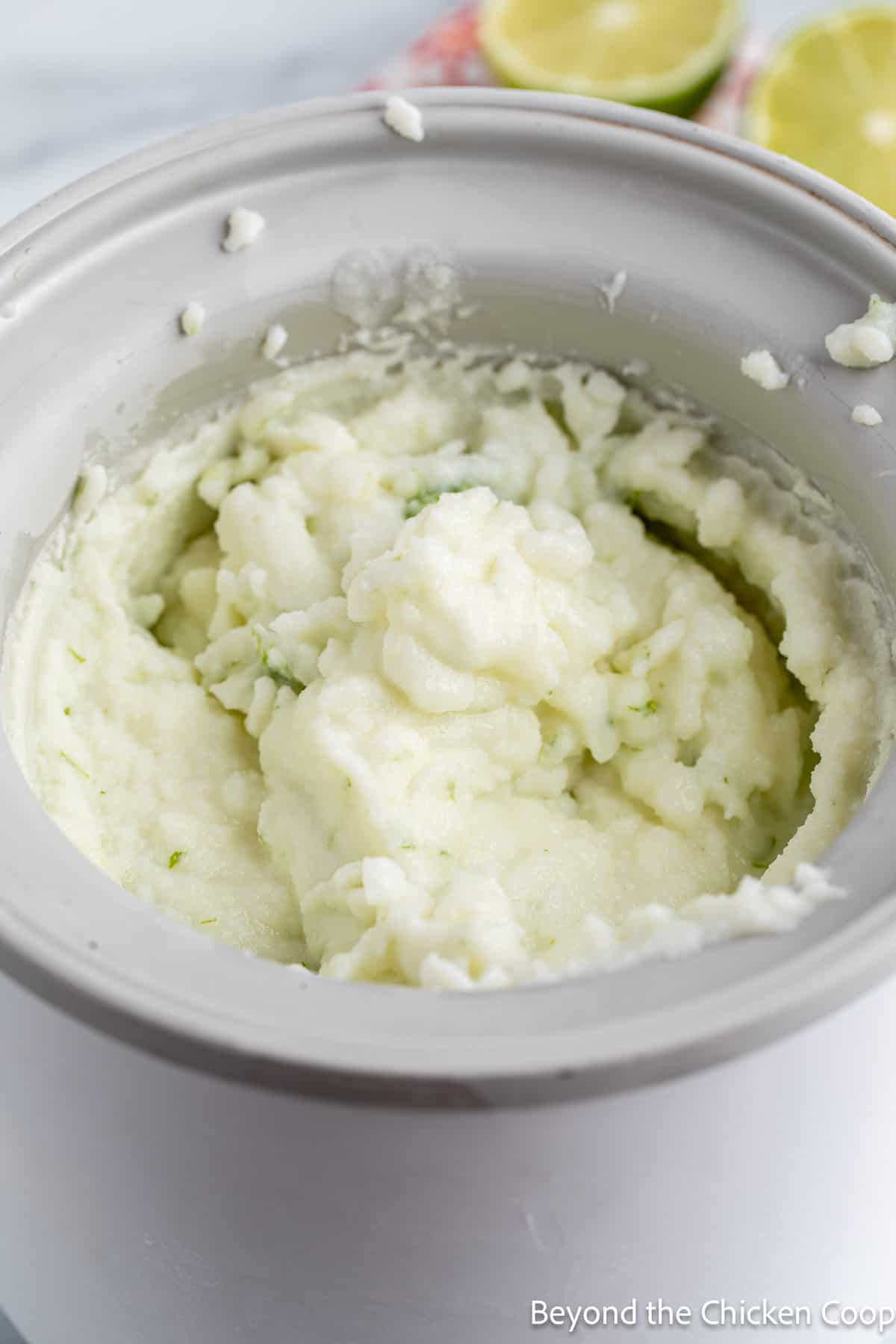 Frozen lime ice cream in a mixer. 