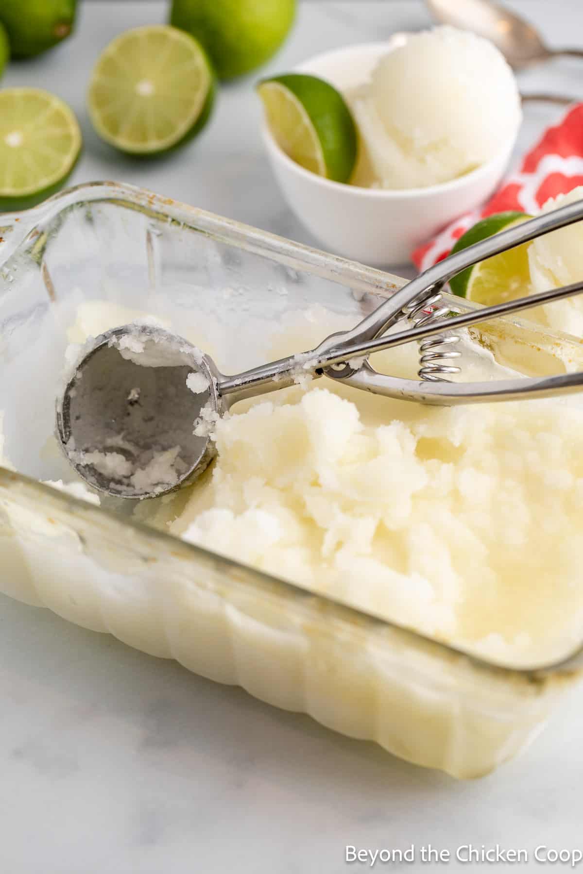 A glass dish filled with sorbet. 