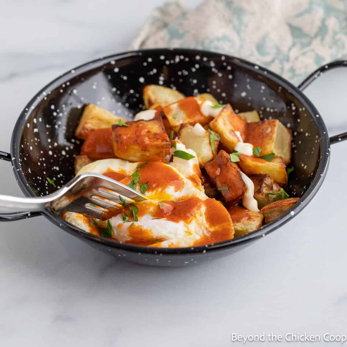 Patatas Bravas with a fried egg. 