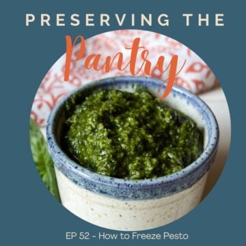 A small dish filled with basil pesto.