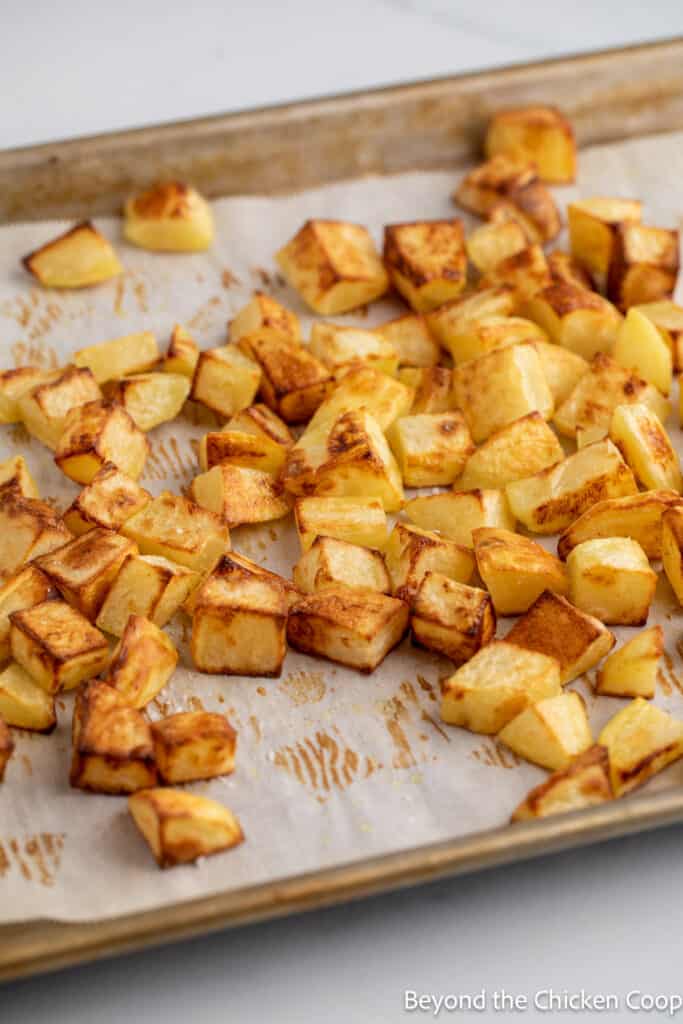 Roasted potatoes on a baking sheet. 