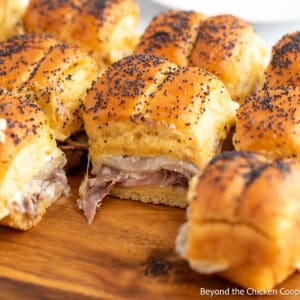 Roast beef sandwiches on a board.