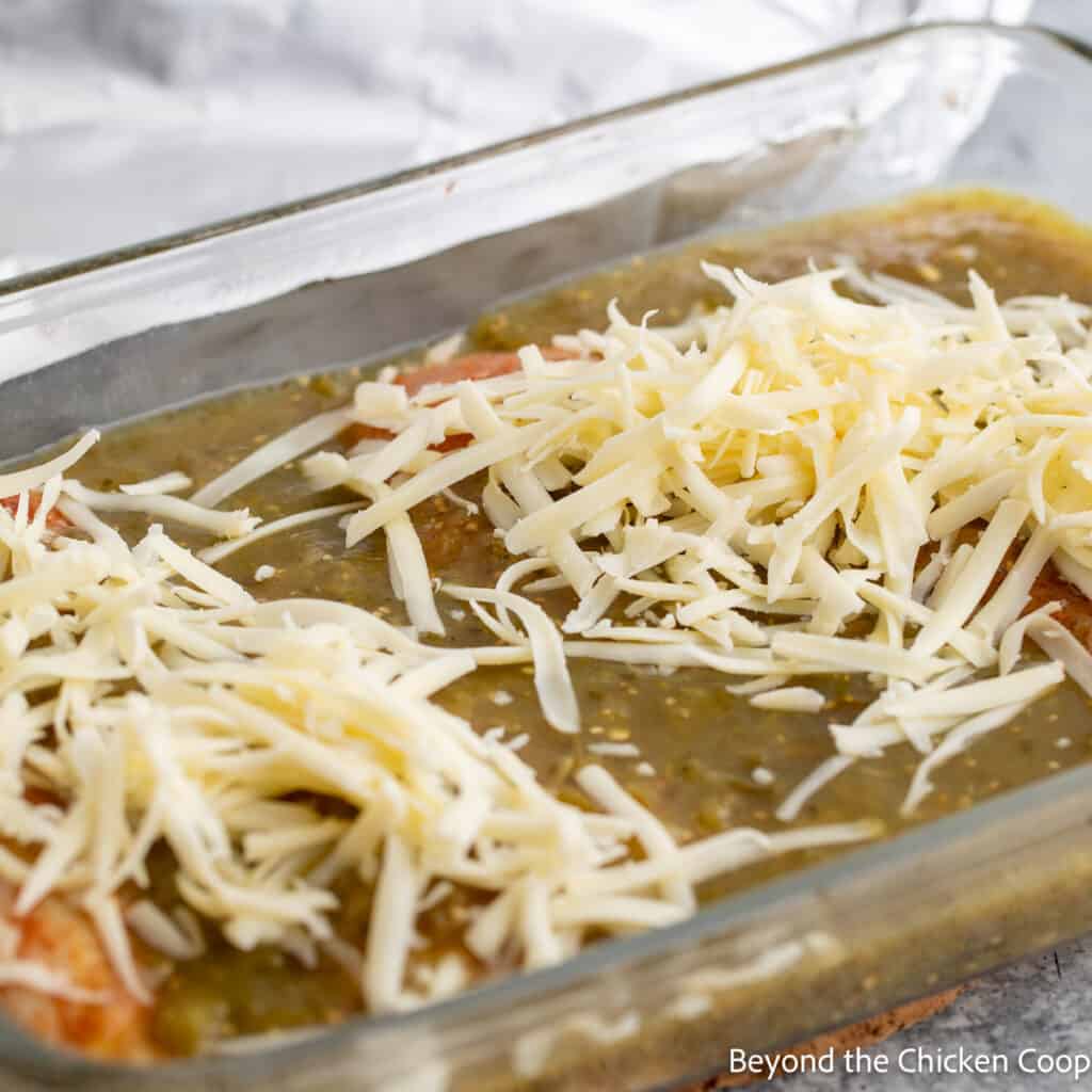 Shredded cheese over a casserole dish.