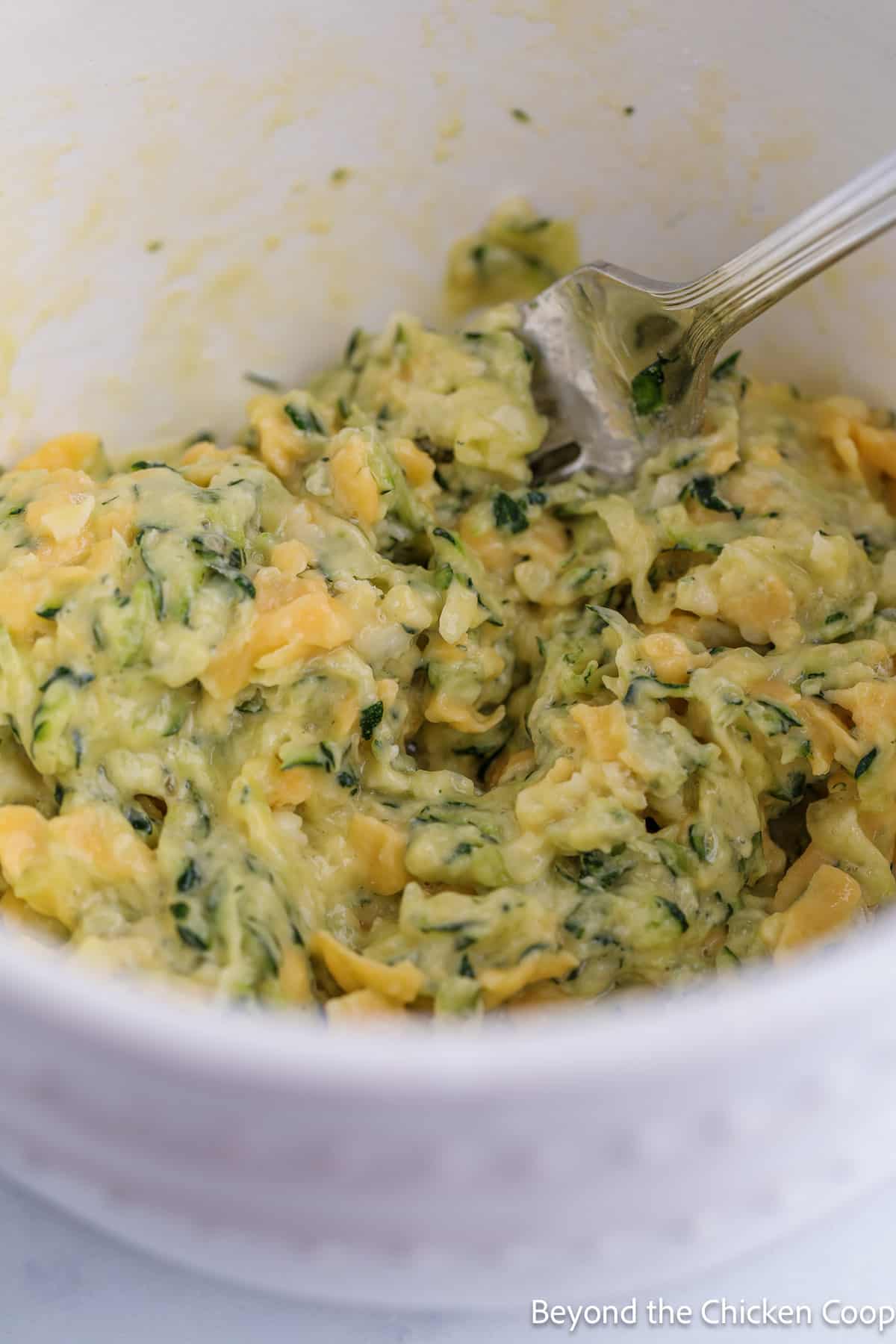 Zucchini batter in a bowl. 