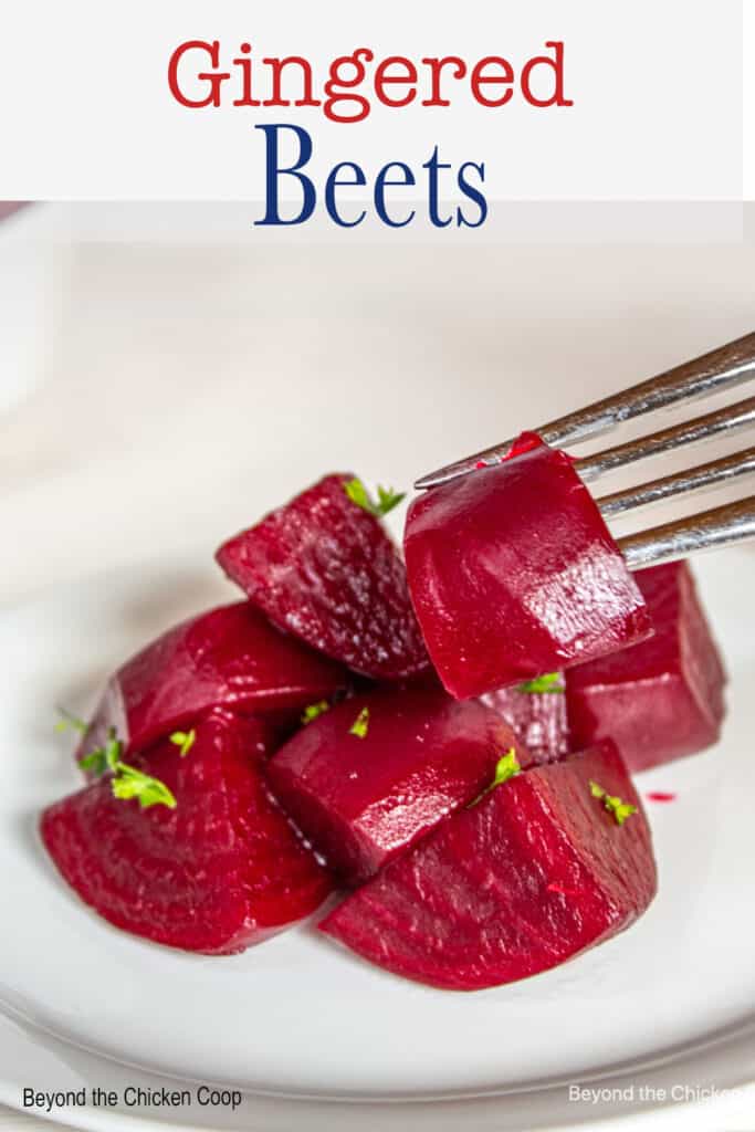 Cooked beets on a white plate.