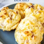 Four biscuits on a blue plate.