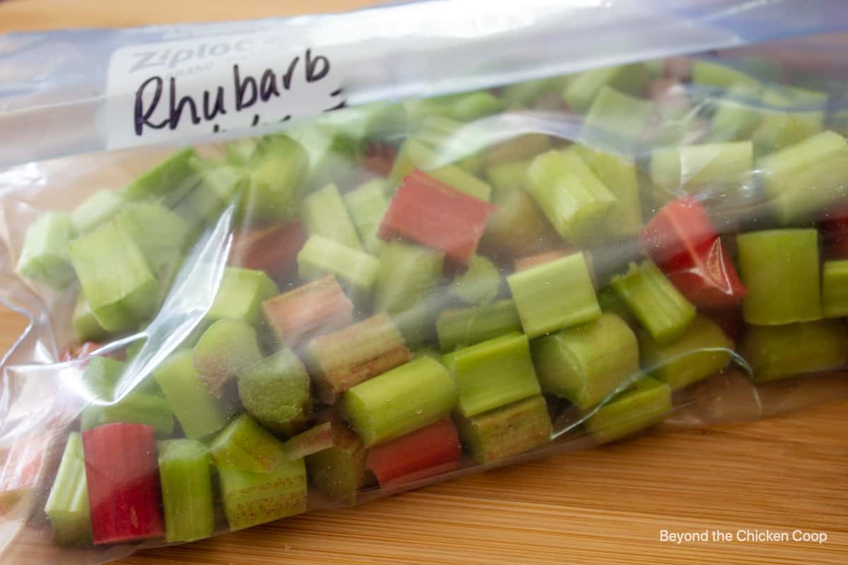 A ziplock bag filled with cut rhubarb.