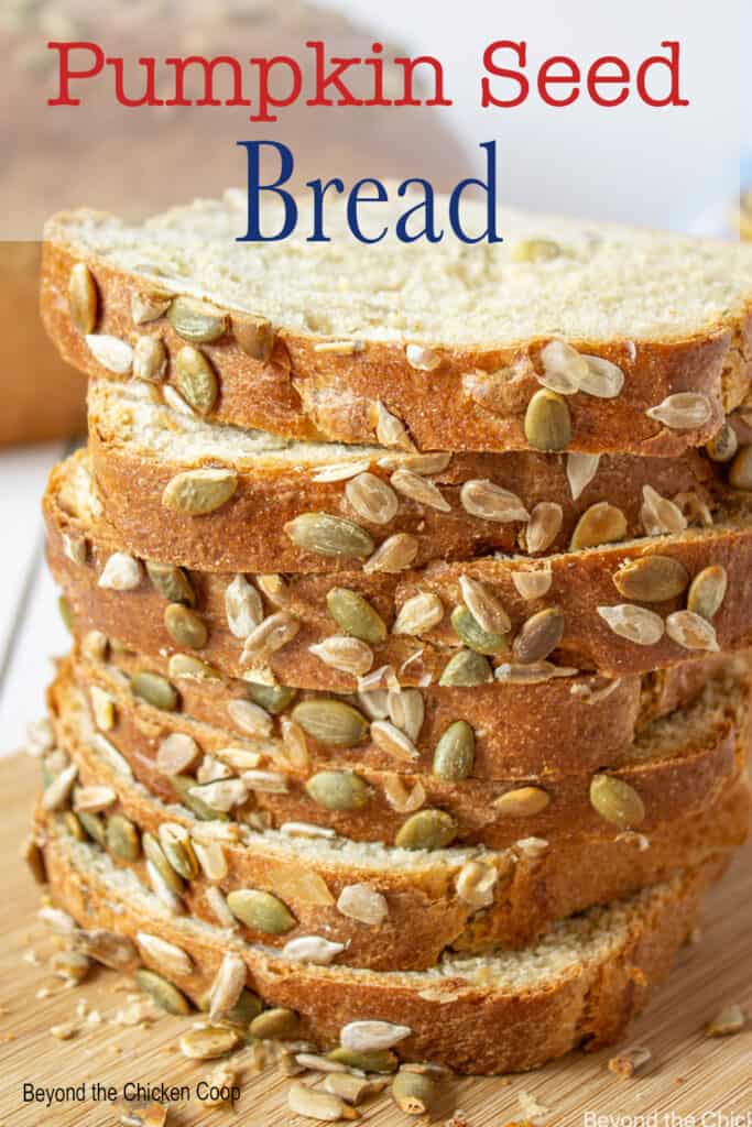 Slices of bread stacked on a board.