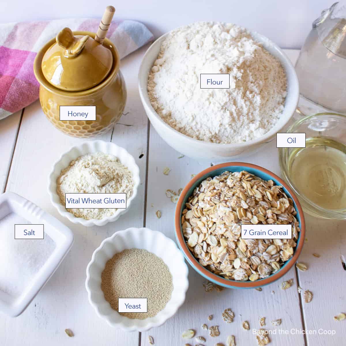 Small bowls filled with flour, oats and other ingredients.