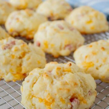 Drop biscuits with cheddar cheese and ham.