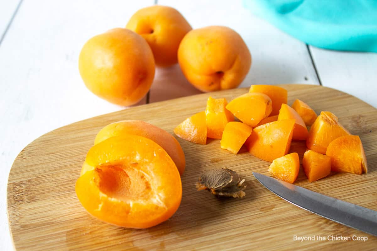 Fresh apricots cut and pitted.