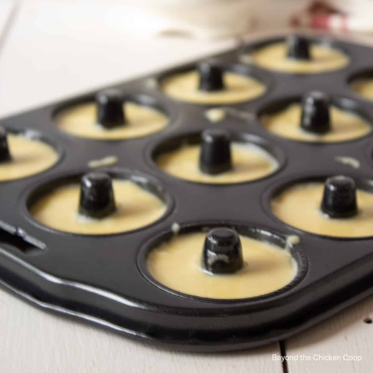 Batter in a mini donut pan.