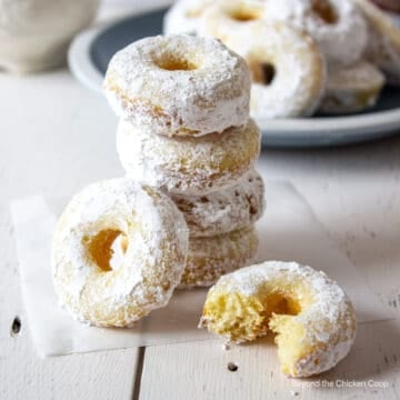Small donuts covered in powdered sugar.