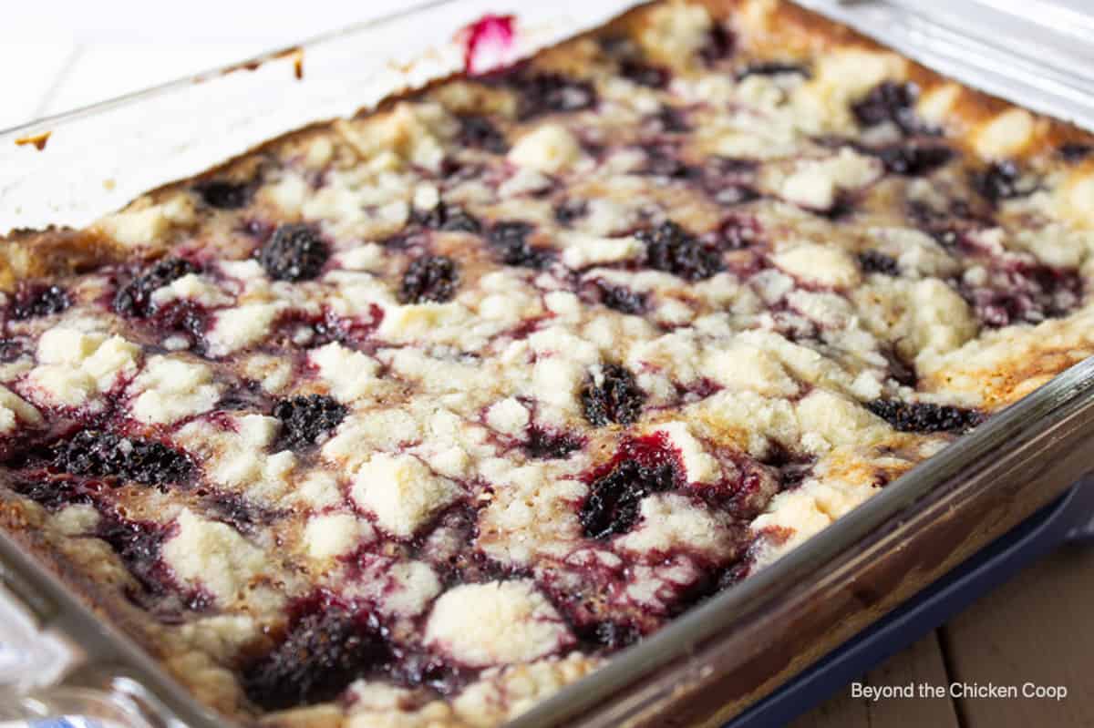 A blackberry dessert in a glass baking dish.