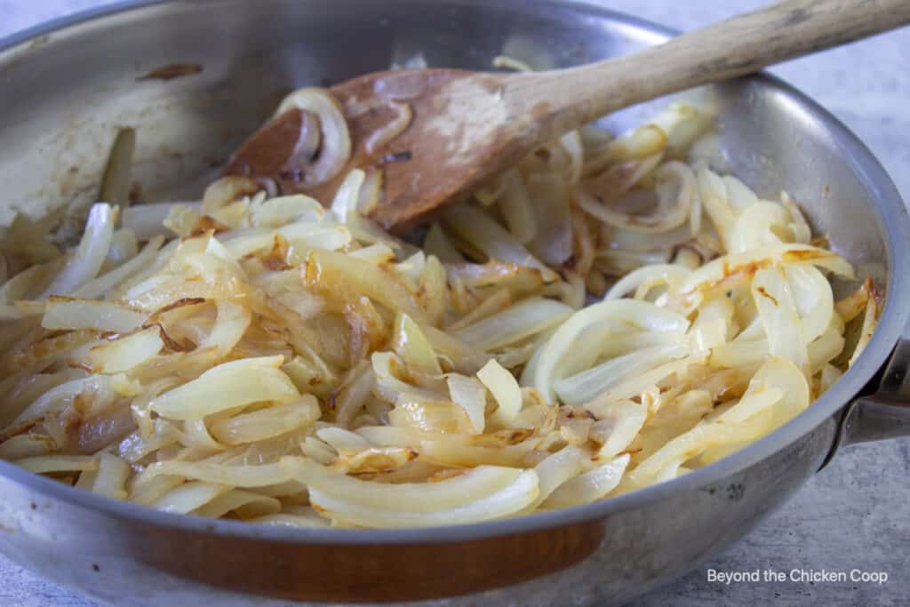 Sautéed onions in a pan.