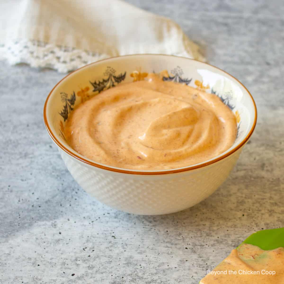 A small bowl filled with chipotle mayo.