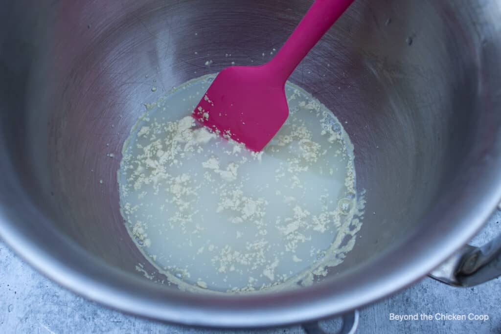 Inactive yeast in a bowl with water.