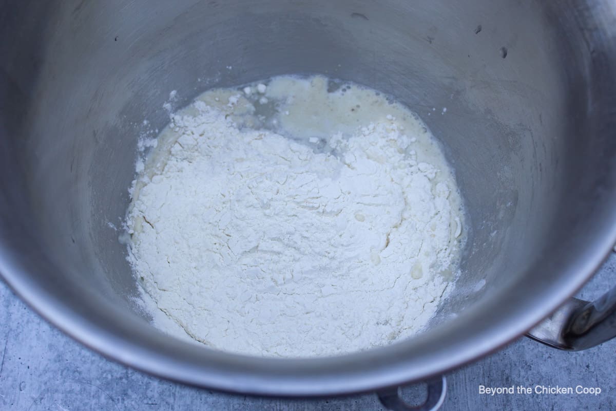 Flour in a bowl with liquids.
