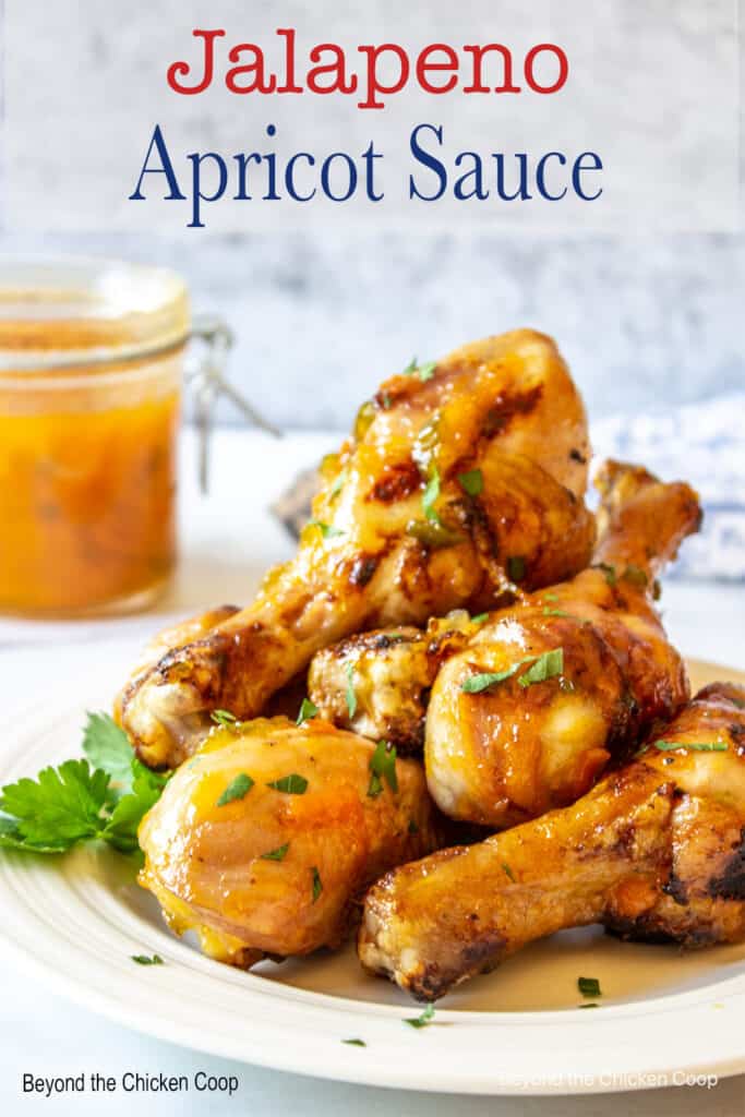 Chicken drumsticks covered with an orange glaze.