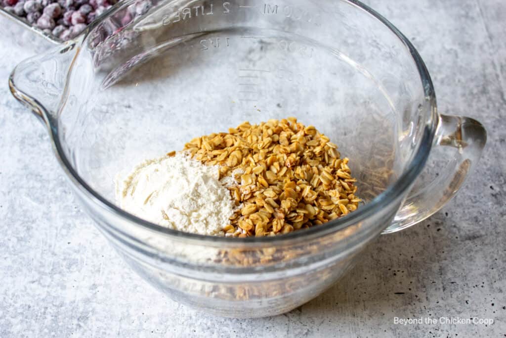 Granola and flour in a bowl.