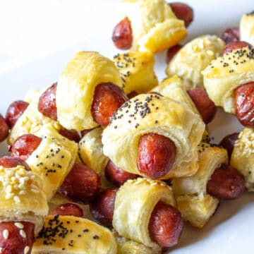 Mini sausages wrapped in puff pastry.