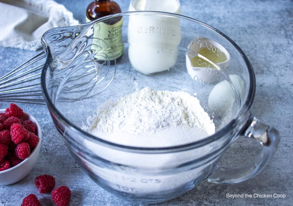 Flour in a glass bowl.