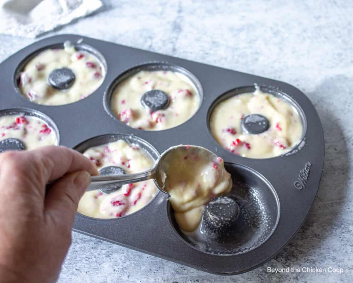 A donut pan filled with batter.