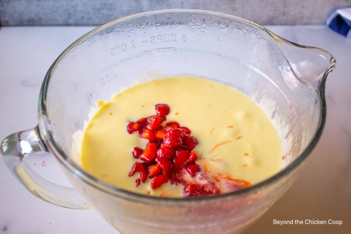 Strawberries added to a chilled custard.