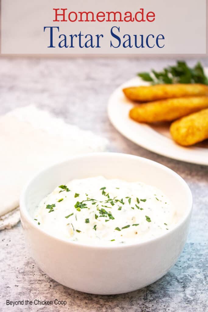 A bowl filled with a thick white sauce.