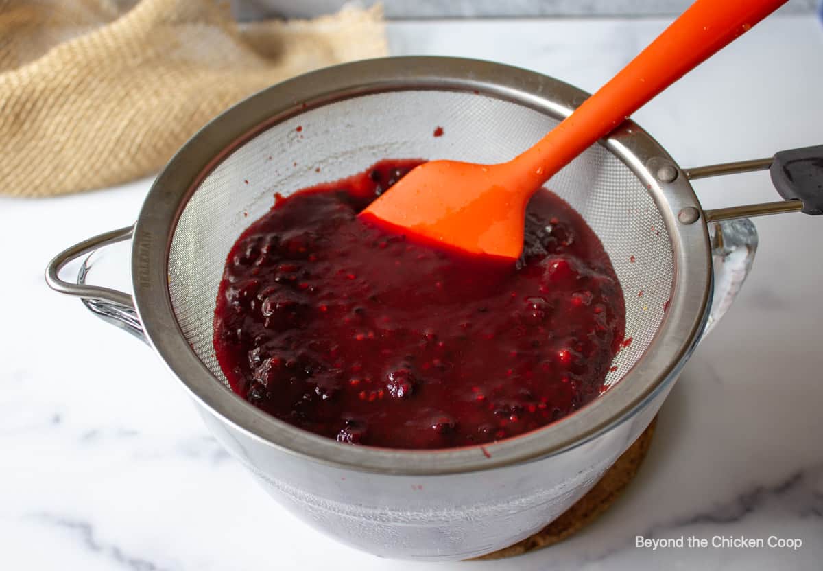 BBQ sauce in a sieve.